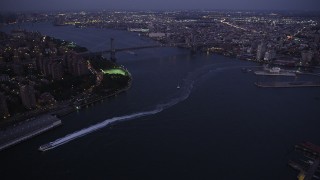 AX89_108 - 4K aerial stock footage Approaching Williamsburg Bridge, New York, New York, twilight