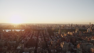 AX90_034 - 4K aerial stock footage Flying by Upper West Side, New York, New York, sunrise