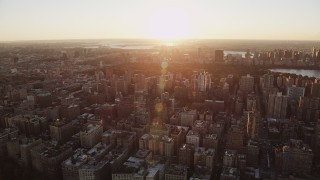 AX90_035 - 4K aerial stock footage Flying by Upper West Side, New York, New York, sunrise