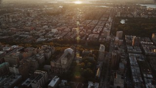 AX90_037 - 4K aerial stock footage of the Cathedral of Saint John the Divine, Morningside Heights, New York, sunrise