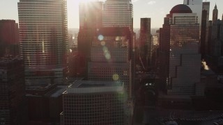 AX90_124 - 4K aerial stock footage Flying by World Trade Center, Lower Manhattan, New York, New York, sunrise