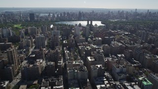 AX91_011 - 4K aerial stock footage of passing Upper West Side apartment buildings, New York, New York