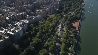 AX91_012 - 4K aerial stock footage of flying away from Henry Hudson Parkway, Upper West Side, New York, New York