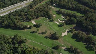 AX91_028 - 4K aerial stock footage of flying over Pelham Split Rock Golf Course in The Bronx, New York