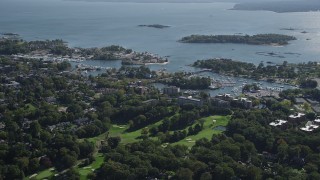 AX91_029 - 4K aerial stock footage of flying by a marina on the coast, New Rochelle, New York