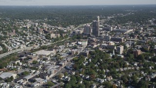 AX91_030 - 4K aerial stock footage of flying by shops and office buildings, New Rochelle, New York