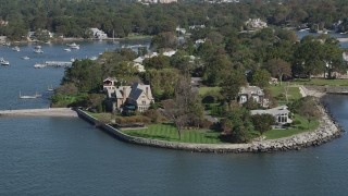 AX91_036 - 4K aerial stock footage of approaching oceanfront mansions in Mamaroneck, New York
