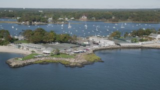 AX91_044 - 4K aerial stock footage of passing the American Yacht Club, Rye, New York