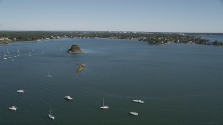 AX91_064 - 4K aerial stock footage of flying over sailboats in Greenwich Cove, Greenwich, Connecticut