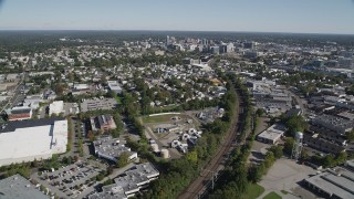 AX91_070 - 4K aerial stock footage of flying over Innis Arden Golf Club, revealing Downtown Stamford, Connecticut