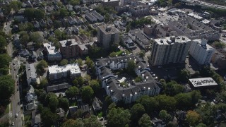 AX91_079 - 4K aerial stock footage of flying by apartment buildings, suburban homes, Stamford, Connecticut