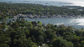 AX91_090 - 4K aerial stock footage of approaching waterfront property on Five Mile River, Norwalk, Connecticut