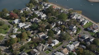AX91_097 - 4K aerial stock footage of flying over waterfront homes in Norwalk, Connecticut