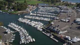 AX91_098 - 4K aerial stock footage tilt from the water to reveal Norwalk Cove Marina, Norwalk, Connecticut