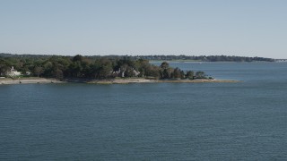 AX91_105 - 4K aerial stock footage of oceanfront mansions on the shore, Westport, Connecticut