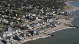 AX91_121 - 4K aerial stock footage of beachfront homes in Stratford, Connecticut