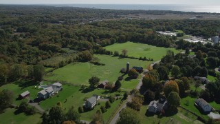 AX91_186 - 4K aerial stock footage of flying over rural neighborhoods in autumn, Guilford, Connecticut