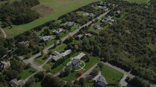 AX91_196 - 4K aerial stock footage of flying over upscale homes in Southold, New York