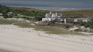 AX91_221 - 4K aerial stock footage of upscale beach homes in Southampton, New York