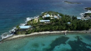 AX96_164 - 5k stock footage aerial stock footage orbiting the mansion on Little St James Island, St Thomas, Virgin Islands