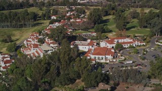 AXSF01_013 - 5K aerial stock footage of approaching the Ojai Valley Inn and Spa hotel, Ojai, California