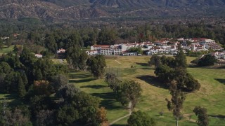 AXSF01_015 - 5K aerial stock footage of a wider view of the Ojai Valley Inn and Spa hotel, Ojai, California