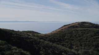 AXSF01_025 - 5K aerial stock footage flyby Santa Ynez Mountains with a view of Santa Barbara Channel, Santa Cruz Island, California