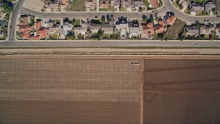 AXSF02_005 - 5K aerial stock footage of bird's eye view over farm fields, suburban neighborhoods, Santa Maria, California