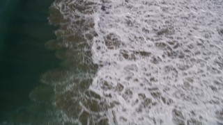 AXSF02_030 - 5K aerial stock footage of a bird's eye view of Pacific Ocean waves, Shell Beach, California
