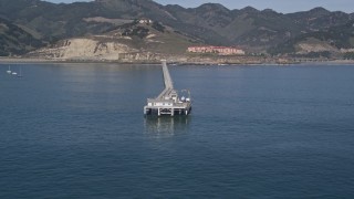 AXSF02_040 - 5K aerial stock footage flyby and away from the end of a pier, Avila Beach, California