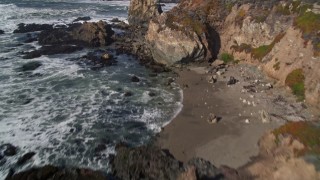 AXSF02_052 - 5K aerial stock footage fly over coastal cliffs, reveal rock formations off the coast, Avila Beach, California