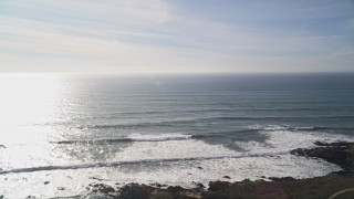 AXSF03_017 - 5K aerial stock footage view of the Pacific Ocean from the coastline, Harmony, California