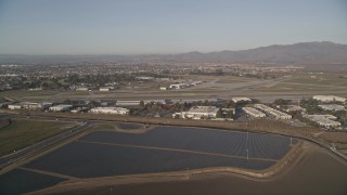 AXSF03_115 - 5K aerial stock footage of approaching the Salinas Municipal Airport, Salinas, California