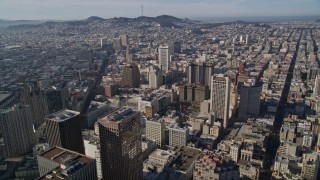 AXSF05_010 - 5K aerial stock footage fly over skyscrapers and high-rises in Downtown San Francisco toward Civic Center, California