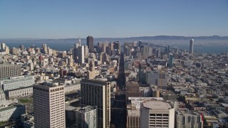 AXSF05_013 - 5K aerial stock footage of following Market Street to approach skyscrapers in Downtown San Francisco, California
