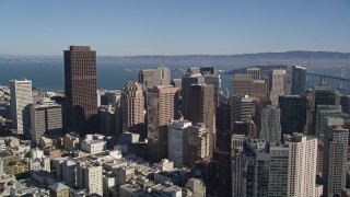 AXSF05_016 - 5K aerial stock footage Follow Market Street, tilt to reveal Financial District skyscrapers, Downtown San Francisco, California