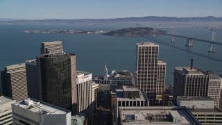 AXSF05_017 - 5K aerial stock footage approach islands in the San Francisco Bay and tilt to the Ferry Building, Downtown San Francisco, California