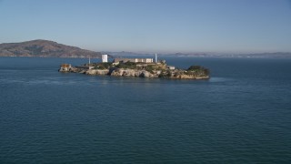 AXSF05_019 - 5K aerial stock footage fly over San Francisco Bay to approach Alcatraz, San Francisco, California