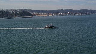 AXSF05_022 - 5K aerial stock footage track a ferry cruising San Francisco Bay, California