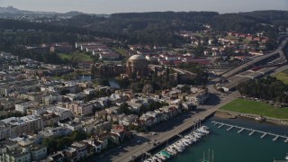 AXSF05_027 - 5K aerial stock footage tilt from San Francisco Bay to reveal Yacht Harbor and Palace of Fine Arts, San Francisco, California
