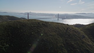 AXSF05_041 - 5K aerial stock footage Golden Gate Bridge and downtown skyline seen from the Marin Headlands, Marin County, California
