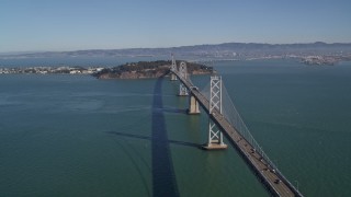 AXSF05_076 - 5K aerial stock footage of a view of the Bay Bridge, Yerba Buena Island, Treasure Island in San Francisco, California
