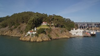 AXSF05_078 - 5K aerial stock footage flyby Yerba Buena Lighthouse, US Coast Guard Station San Francisco Pier, San Francisco, California
