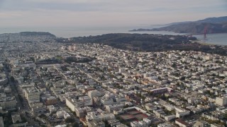 AXSF06_025 - 5K aerial stock footage pan across Marina District, Pacific Heights, reveal university in Western Addition, San Francisco, California