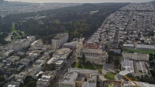 AXSF06_026 - 5K aerial stock footage pan from University of San Francisco to approach St. Ignatius Church, San Francisco, California