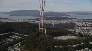 AXSF06_038 - 5K aerial stock footage orbit and fly away from iconic Sutro Tower, with a view across San Francisco, California