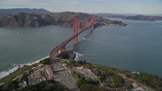 AXSF06_042 - 5K aerial stock footage fly over The Presidio and freeway toll booth, reveal Golden Gate Bridge, San Francisco, California