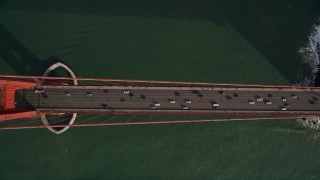 AXSF06_043 - 5K aerial stock footage of a bird's eye view of traffic on the famous Golden Gate Bridge, San Francisco, California