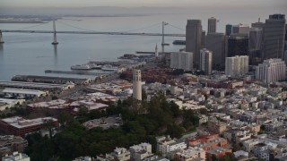 AXSF06_081 - 5K aerial stock footage flyby Coit Tower, revealing skyscrapers in Downtown San Francisco, California