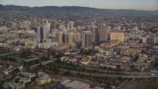 AXSF06_091 - 5K aerial stock footage of approaching federal and office buildings in Downtown Oakland, California